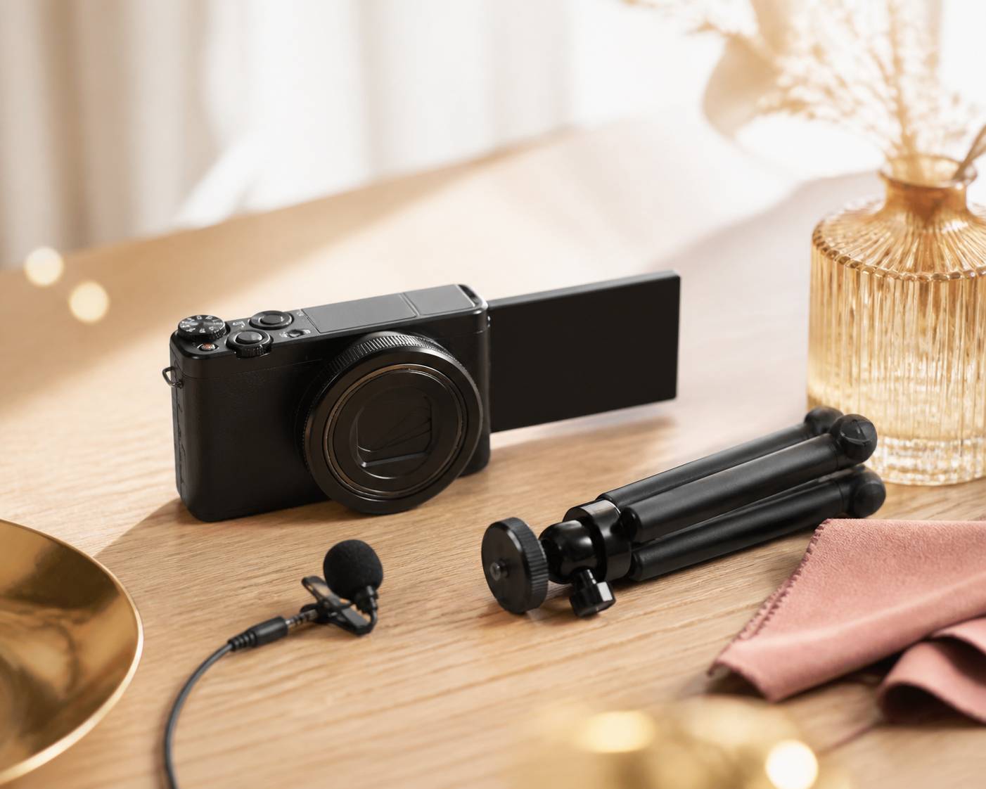 Appareil compact à écran orientable avec trépied